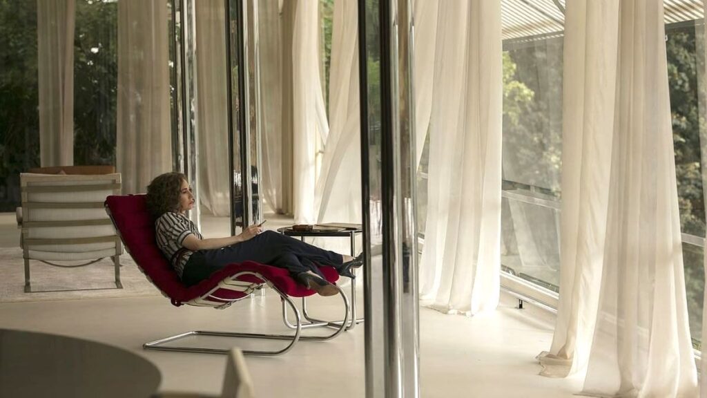 The Affair The Glass Room and Red MR Chaise lounger by Mies van der Rohe