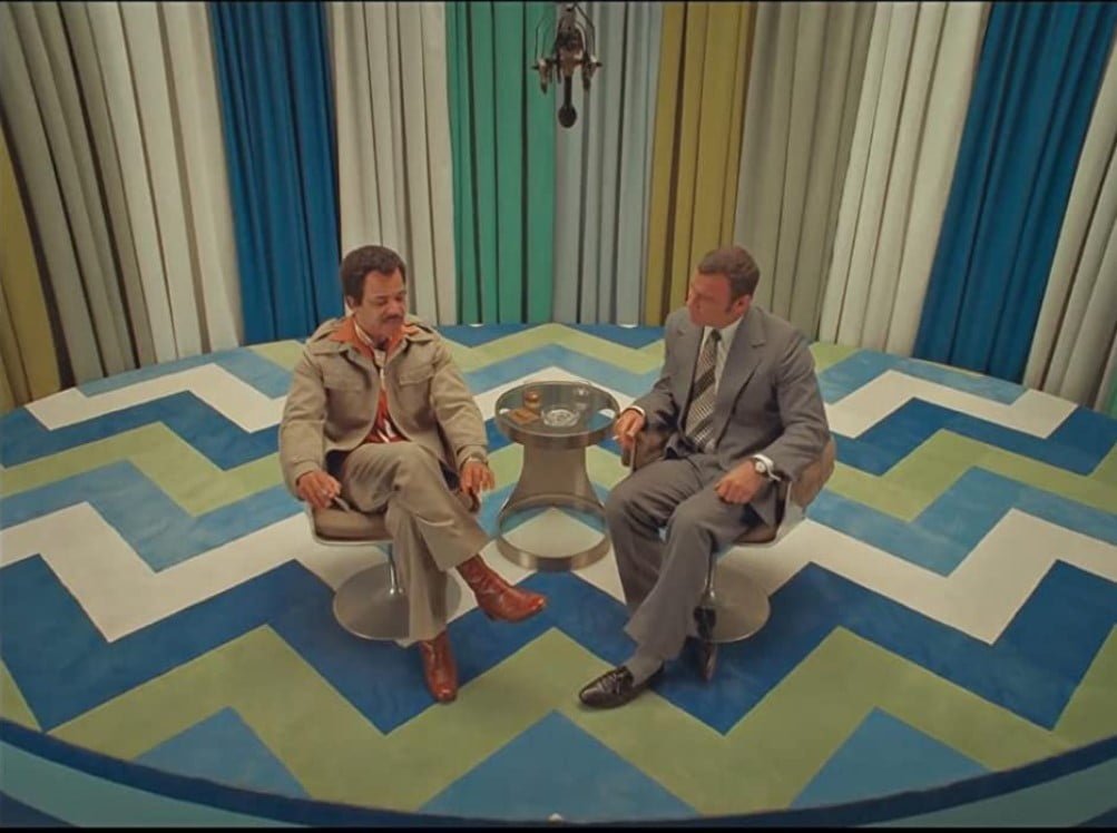 The French Dispatch (2021)- yellow- blue - green - tones - rug and curtains