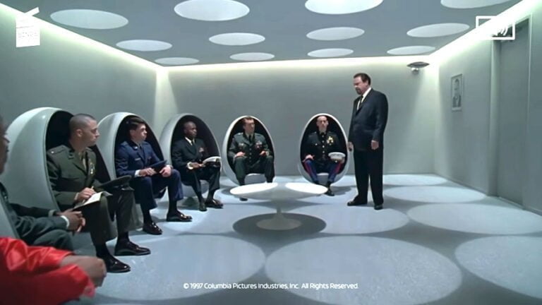 Men in black egg chair