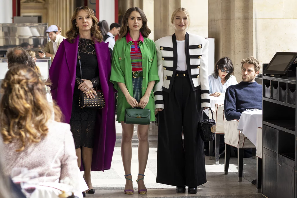 Sylvie-Lace-Dress-Purple-Coat-on-Emily-in-Paris