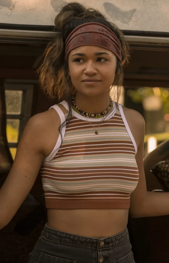 Kiara Carrera’s bohemian striped crop top and high waisted jeans outfit.