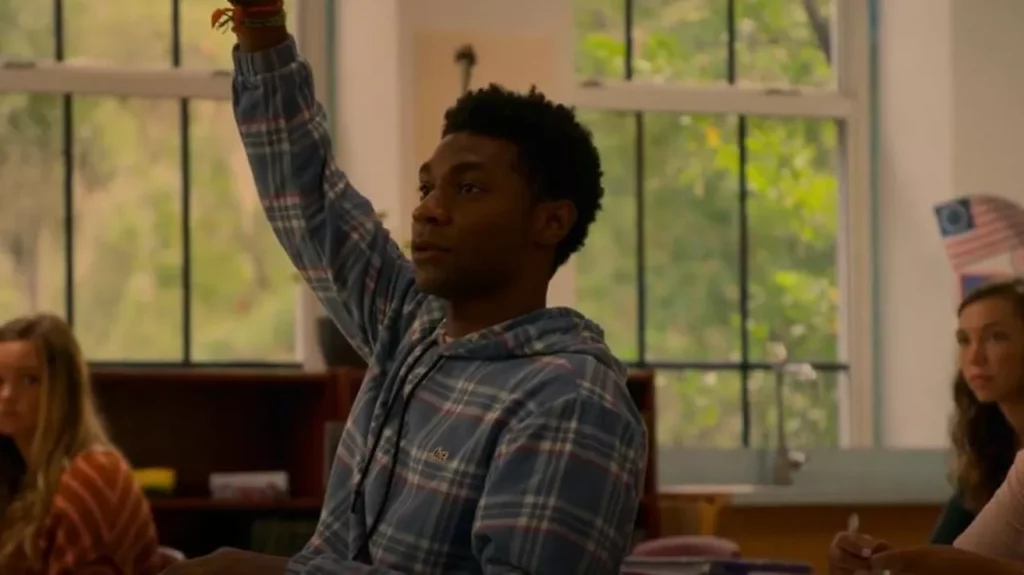 Pope’s blue and cream plaid hoodie outfit from season two.