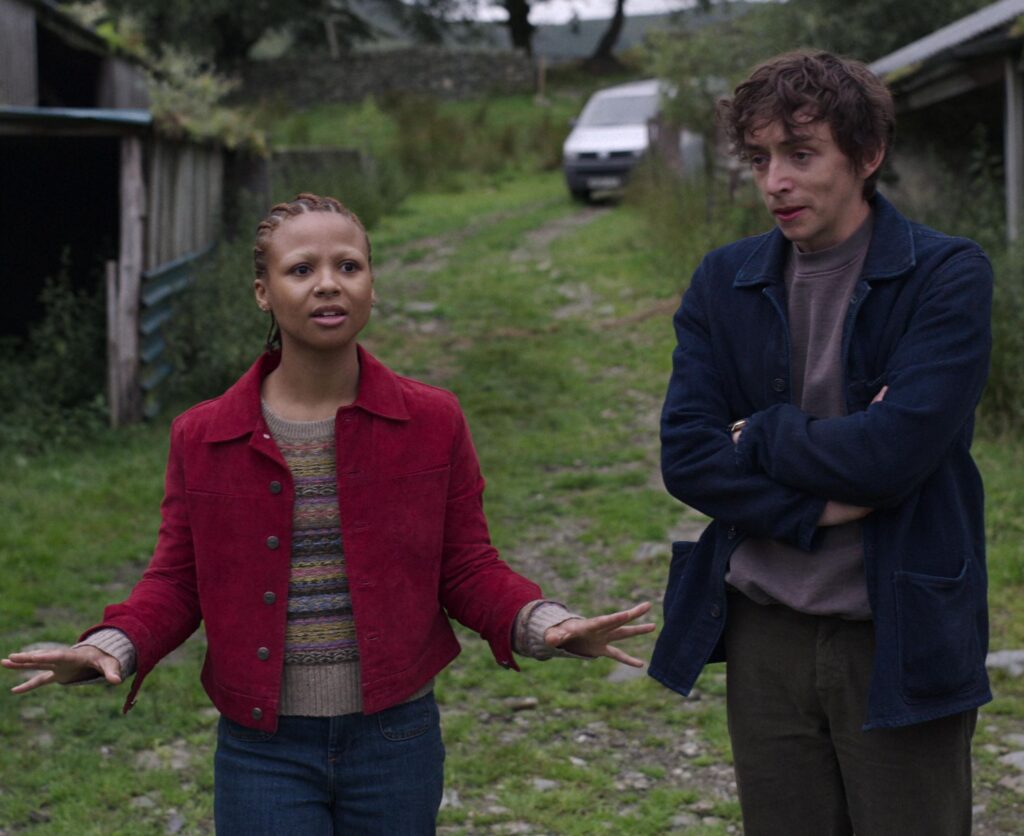 Black Mirror season 6 Outfits- Pia’s Fair Isle Sweater in Episode Two Loch Henry