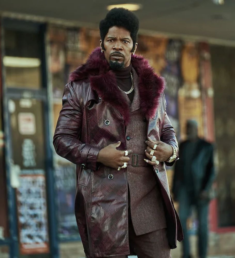 Slick Charles’ Showstopping Purple Leather Coat