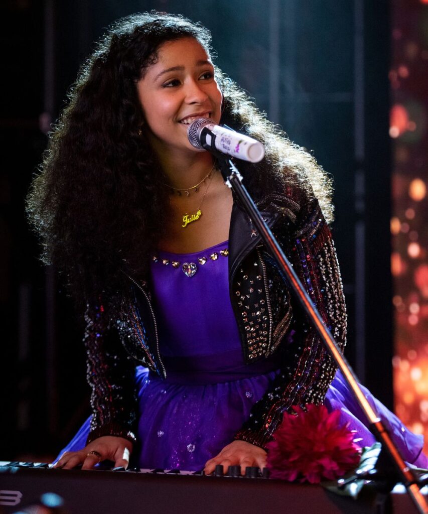 Julie and the Phantoms Outfits -That Rockstar Purple Dress and Leather Jacket from Julie and the Phantoms
