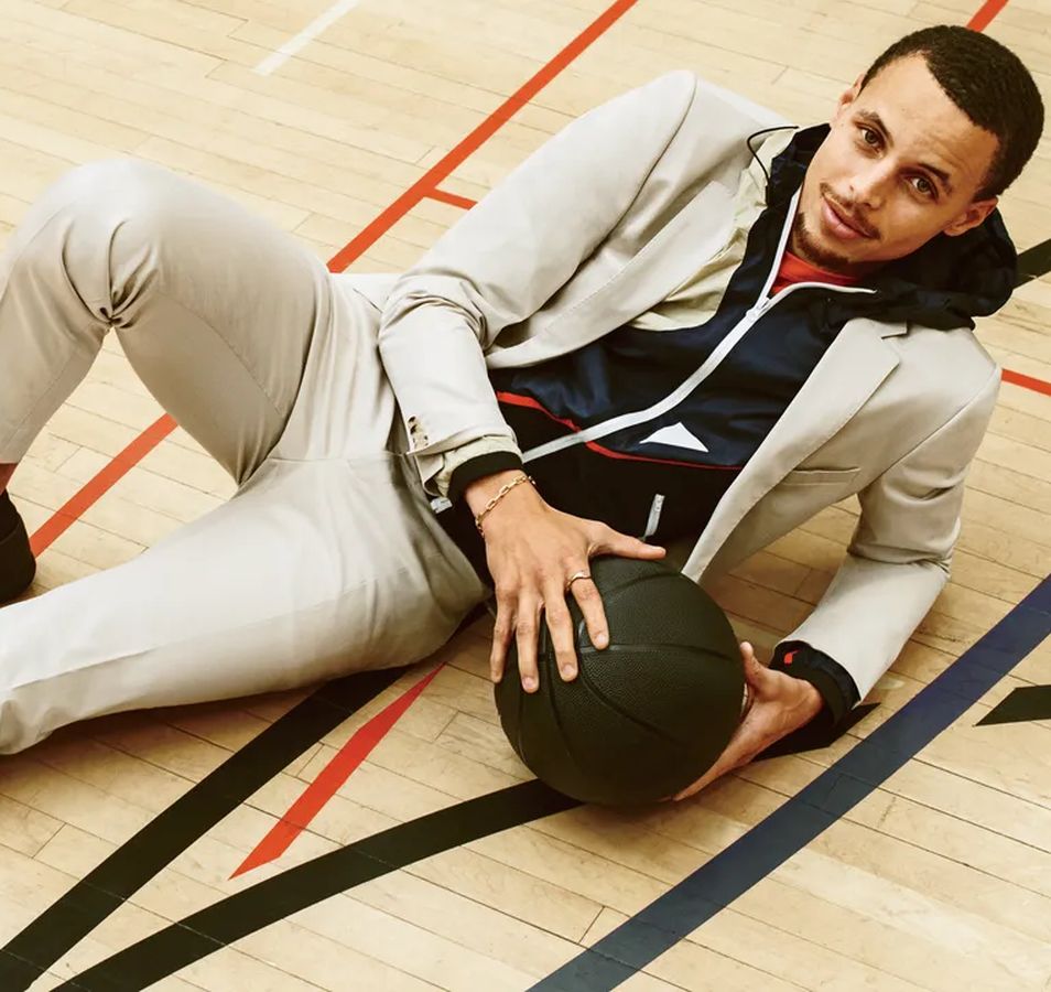 a blazer with a hoodie back into fashion