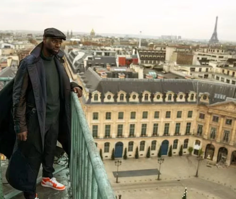 Assane Diop above the rooftops of Paris