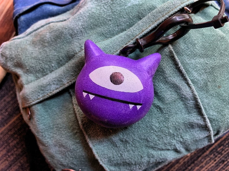 Last of Us Gift Ideas Ellie's Signature Purple Monster Keychain
