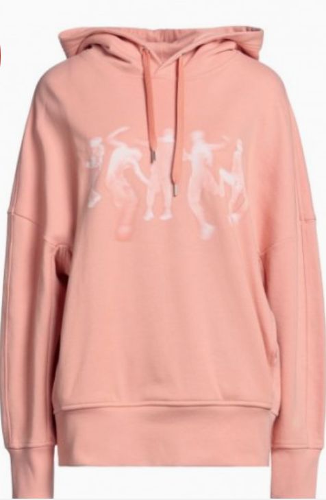 Liza Drakes Orange Hoodie with blurred dancers from Pain Hustlers
