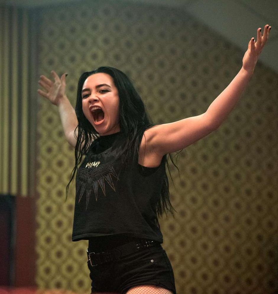 Paige’s All Black Shorts and Top in Autobiographical Movie Fighting With My Family