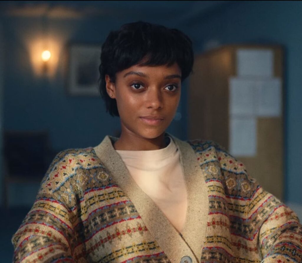 Wardrobe Outfits Style and Looks of Mia Polanco in Netflix’s Everything Now -Mia’s Striped Oversized Cardigan