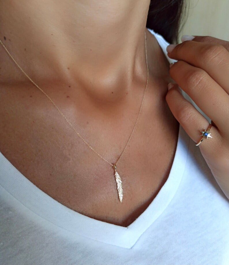 Glass Onion: A Knives Out Mystery Gifts Birdie's Feather Necklace