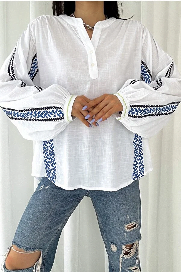 louse in airy, woven cotton fabric with embroidery